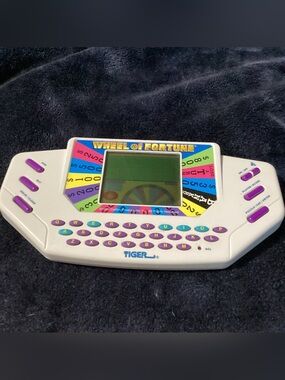Vintage  Wheel of Fortune Handheld LCD Game Tiger Electronics 1995 Tested